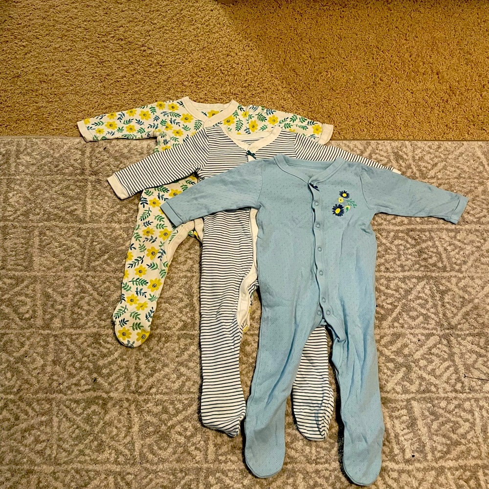 Three Pairs of Footie Onesies by Marks & Spencers in size 9-12 months